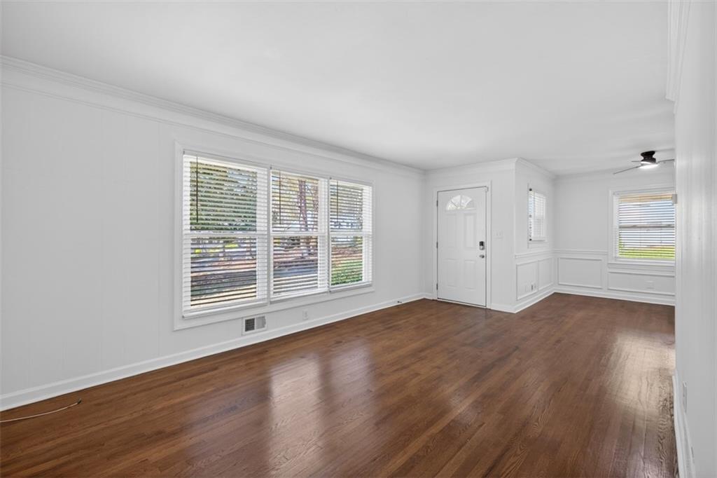 3061 Glendale Court Decatur, GA 30032 - Photo 10 of 21 an empty room with wooden floor and windows