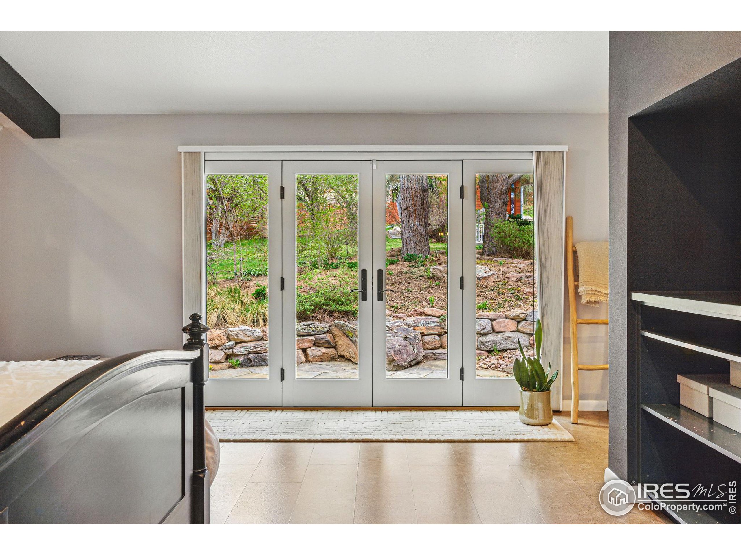182 Ridge Road Boulder, CO 80303 - Photo 14 of 43 a view of an empty room with a window