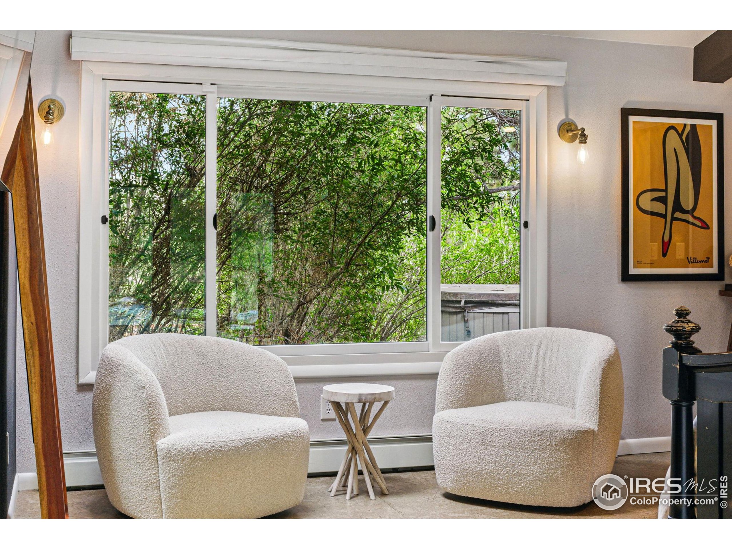 182 Ridge Road Boulder, CO 80303 - Photo 28 of 43 a living room with furniture and a large window