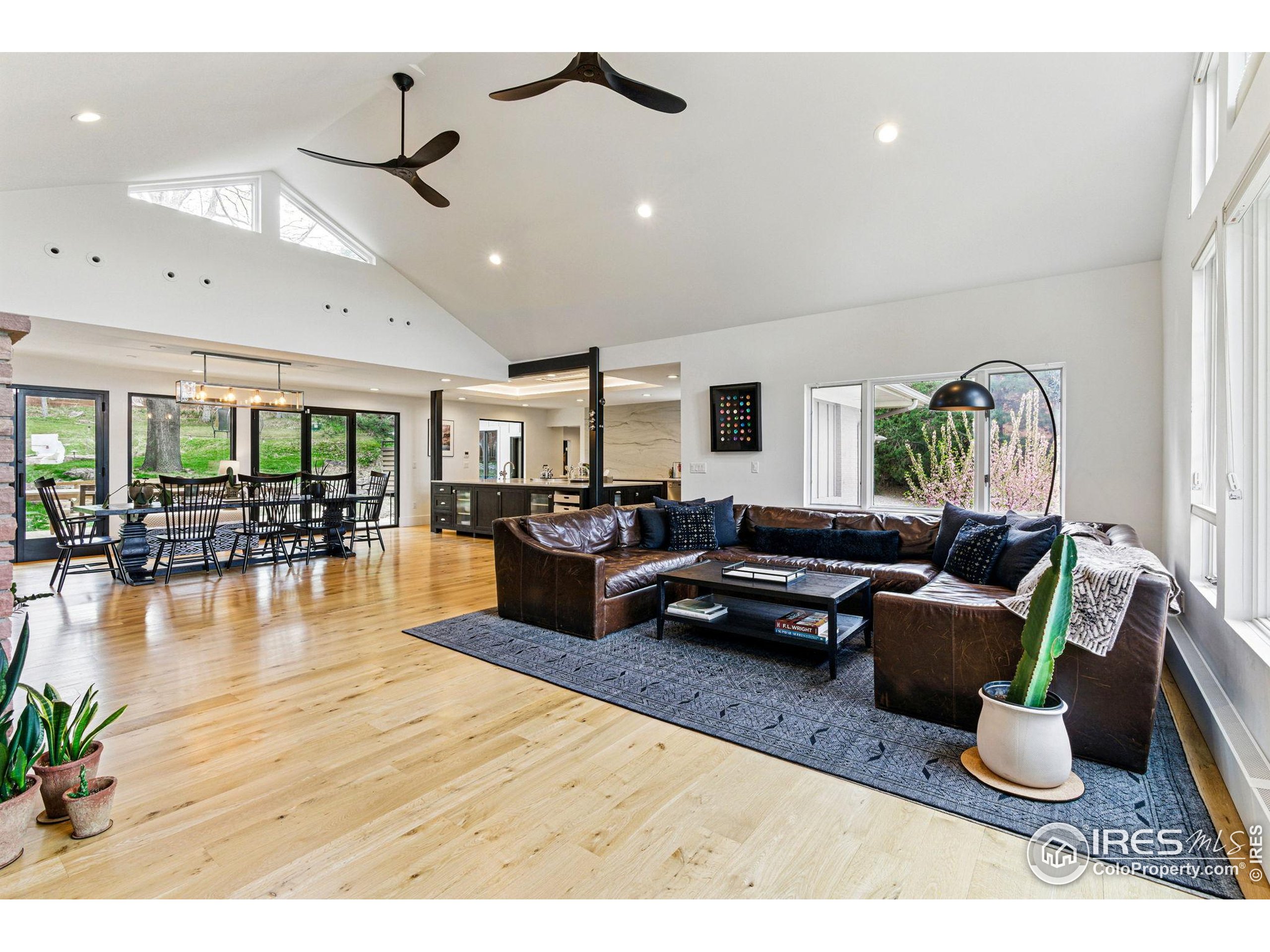 182 Ridge Road Boulder, CO 80303 - Photo 30 of 43 a living room with furniture or wooden floor and a large window