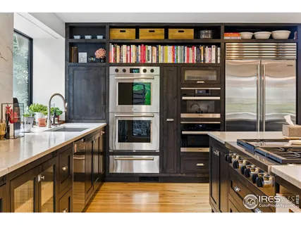a view of a livingroom with furniture and window