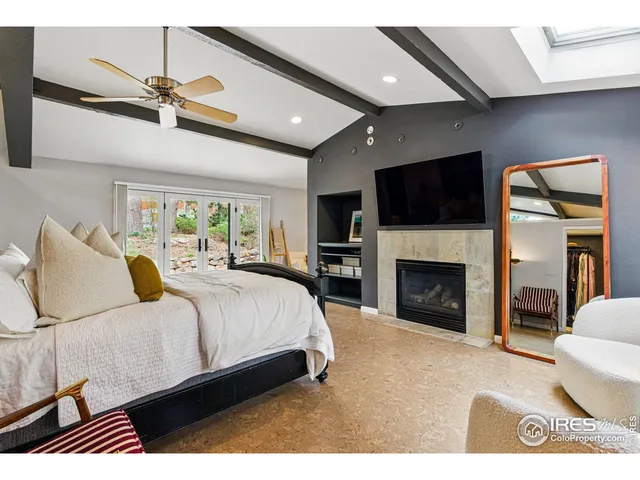 a bathroom with a sink a mirror and a rug
