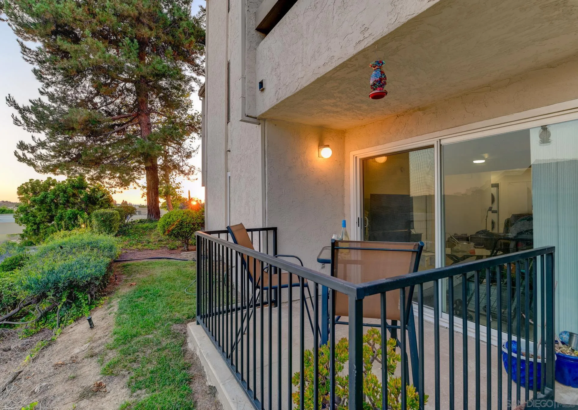 6877 Caminito Mundo, Unit 25 San Diego, CA 92119 - Photo 14 of 28 a view of a porch with backyard