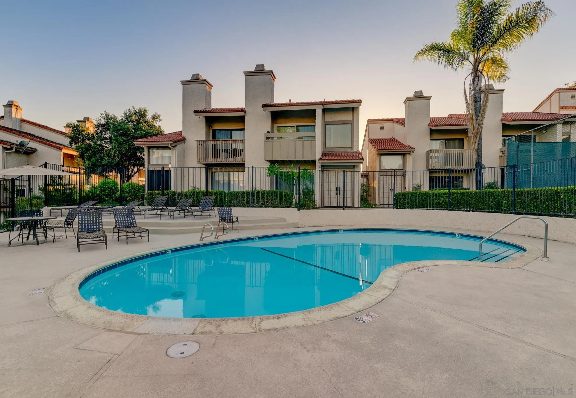 6877 Caminito Mundo, Unit 25 San Diego, CA 92119 - Photo 25 of 28 a view of outdoor space yard swimming pool and patio