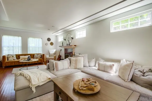 a living room with furniture and a table