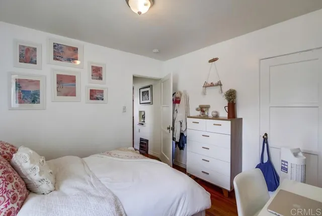 a bedroom with a bed and furniture