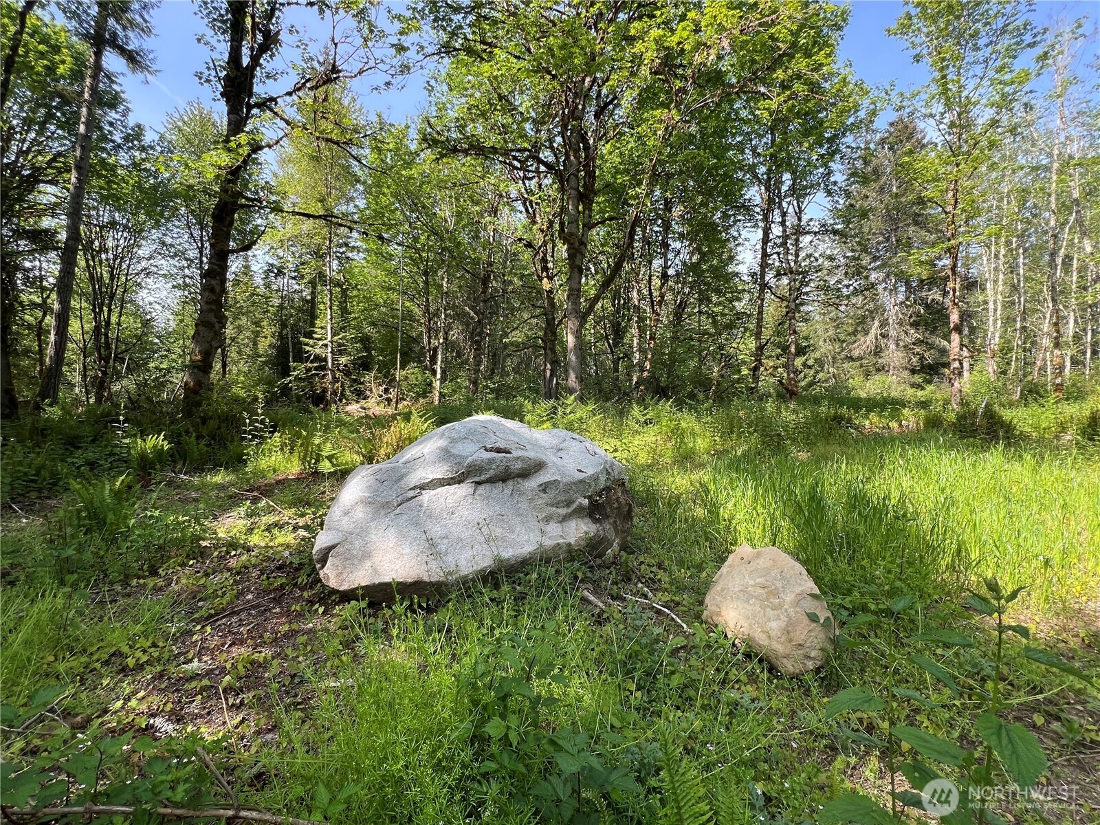 3-xxx Leland Valley Road West Quilcene, WA 98376 - Photo 13 of 23 a aerial view of a house with a yard and lake view