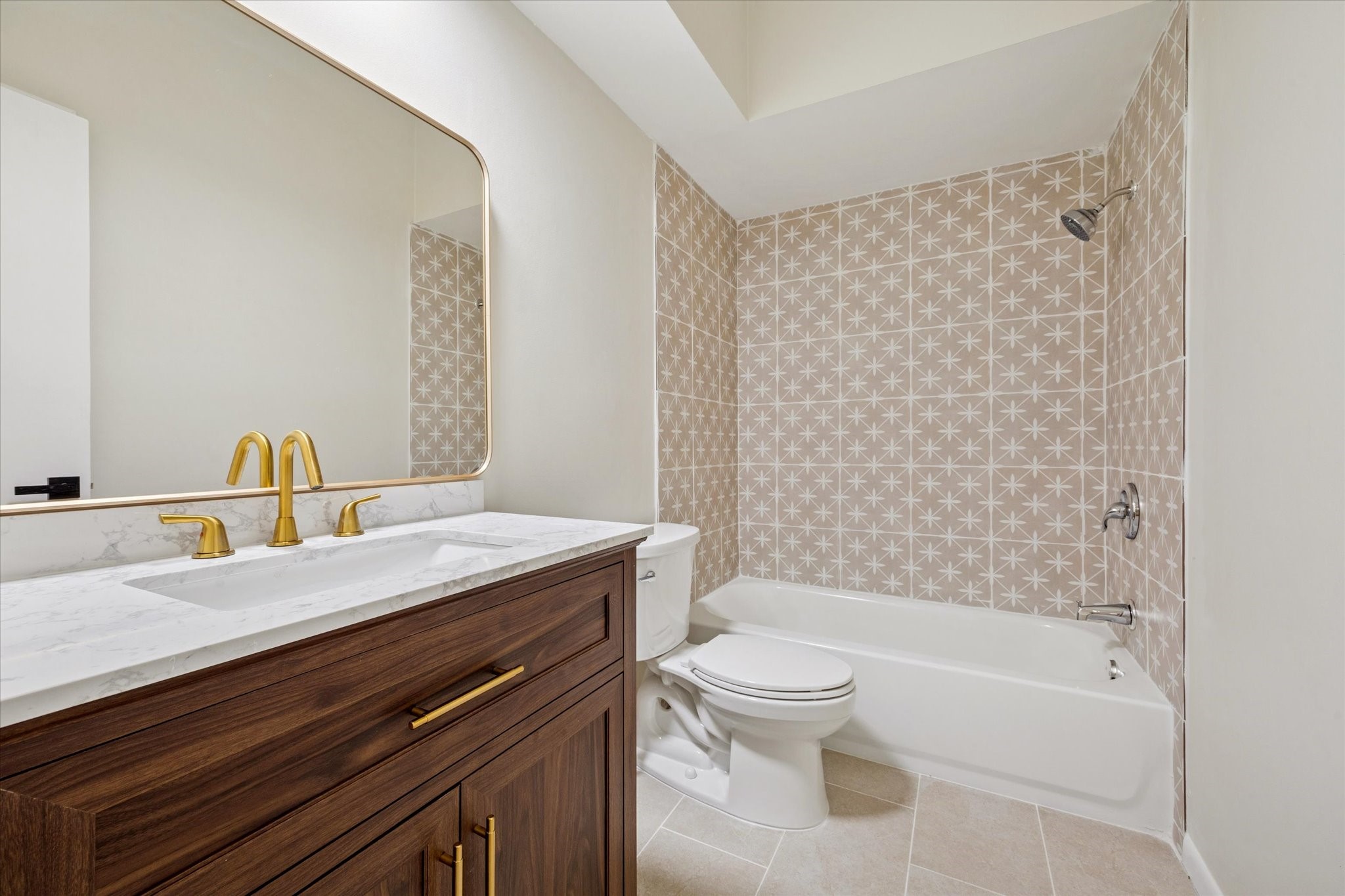 2100 Tanglewilde Street, Unit 195 Houston, TX 77063 - Photo 16 of 34 a bathroom with a sink a toilet and shower