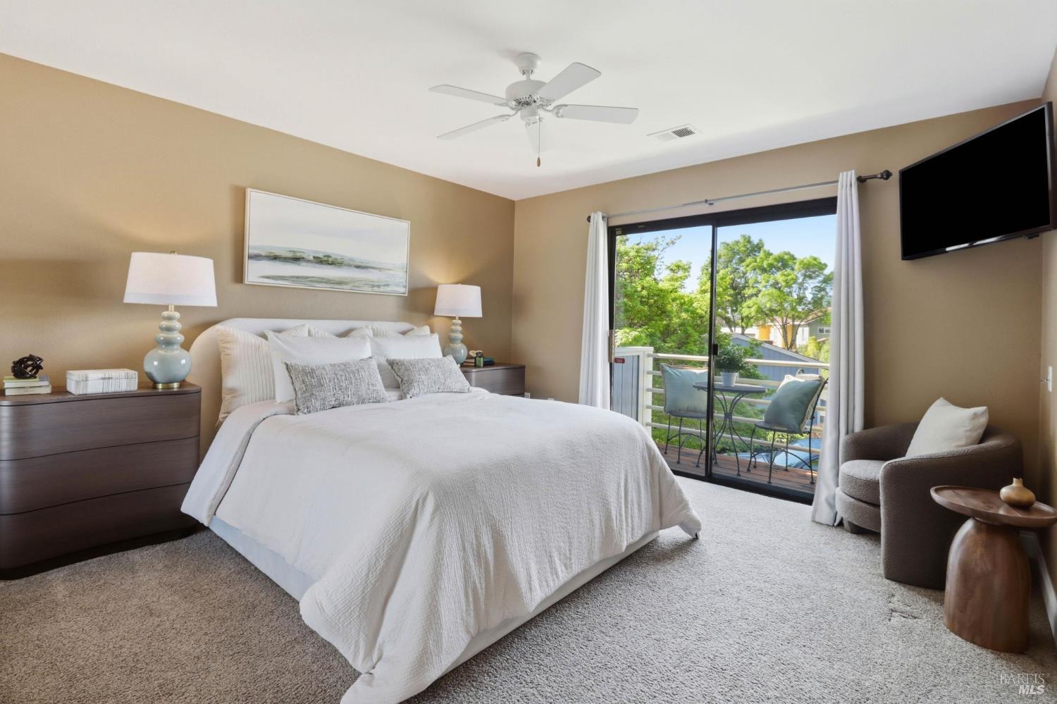 19167 Robinson Road, Unit H Sonoma, CA 95476 - Photo 14 of 32 a bedroom with bed and glass door