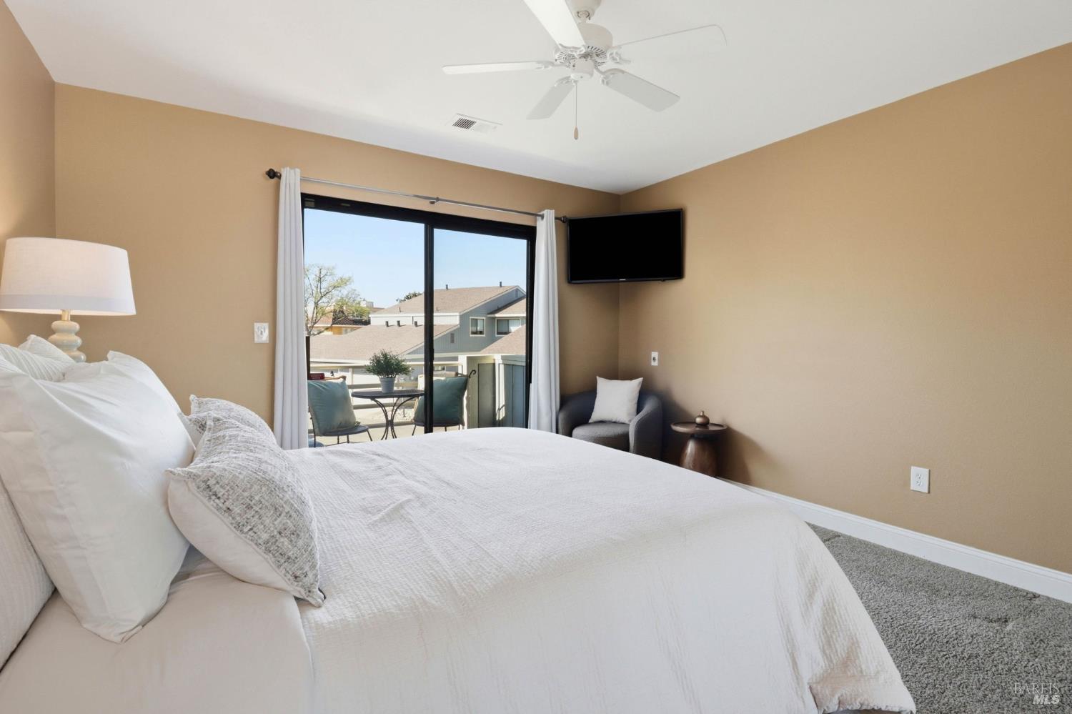 19167 Robinson Road, Unit H Sonoma, CA 95476 - Photo 16 of 32 a bedroom with a bed and a window