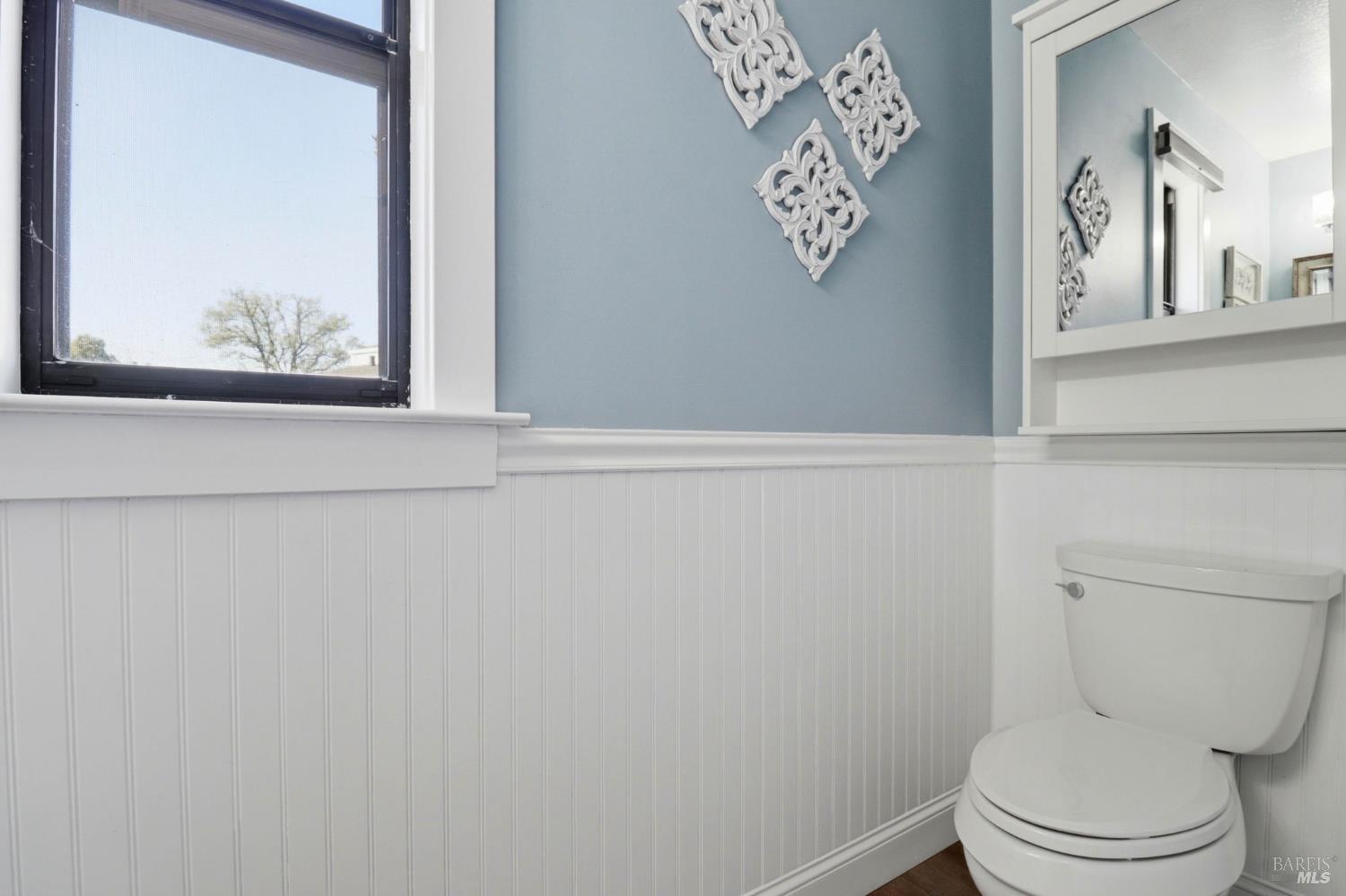 19167 Robinson Road, Unit H Sonoma, CA 95476 - Photo 22 of 32 a white toilet sitting next to a shower