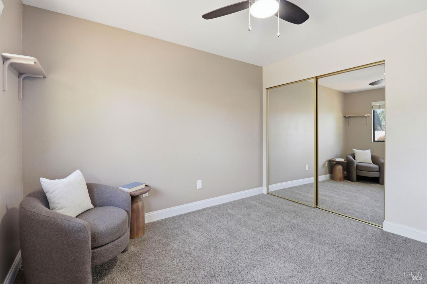 19167 Robinson Road, Unit H Sonoma, CA 95476 - Photo 24 of 32 a living room with furniture and a ceiling fan