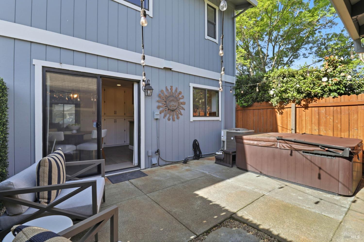 19167 Robinson Road, Unit H Sonoma, CA 95476 - Photo 28 of 32 a backyard of a house with table and chairs
