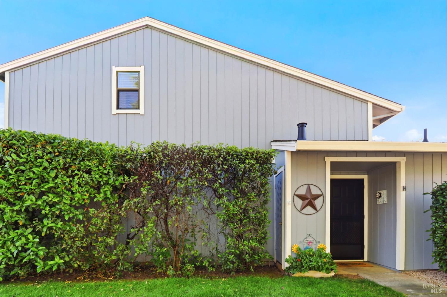 19167 Robinson Road, Unit H Sonoma, CA 95476 - Photo 4 of 32 a front view of a house with garden
