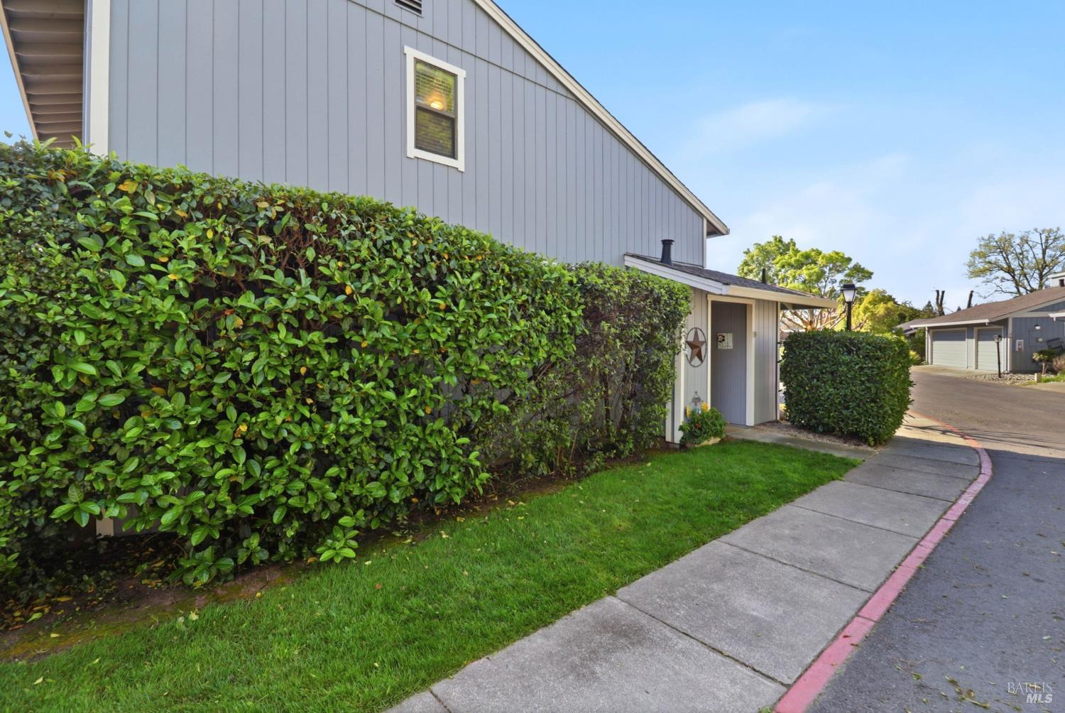 19167 Robinson Road, Unit H Sonoma, CA 95476 - Photo 5 of 32 a view of a house with a yard