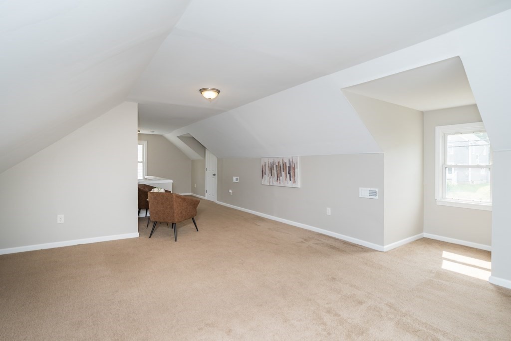 185 Pasco Road Springfield, MA 01151 - Photo 23 of 34 a view of a room with windows and lounge chair