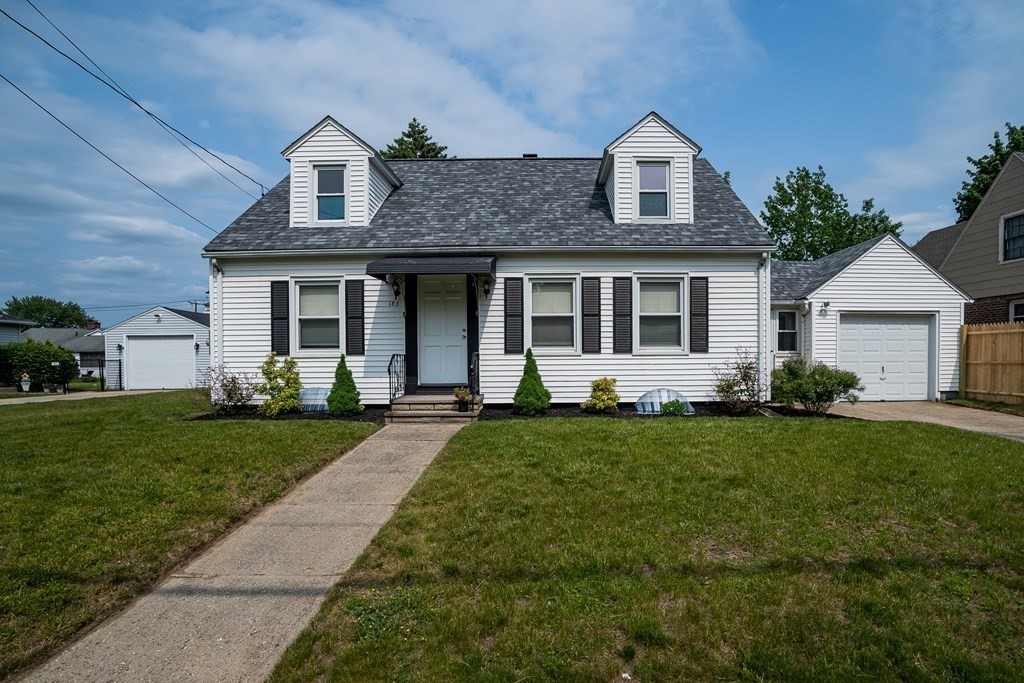 185 Pasco Road Springfield, MA 01151 - Photo 24 of 34 a front view of a house with a yard