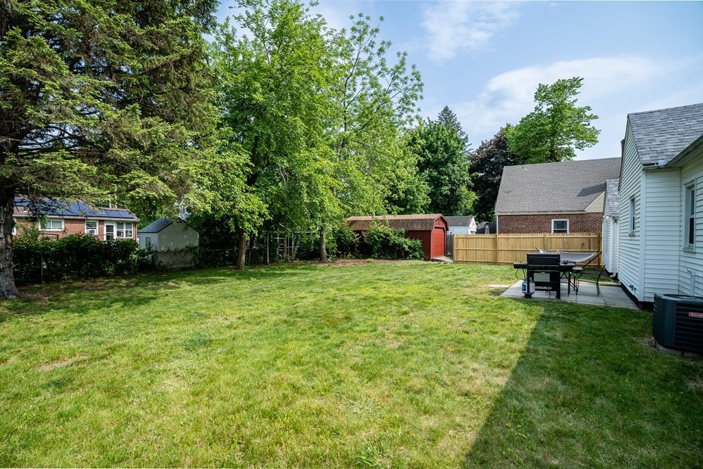 185 Pasco Road Springfield, MA 01151 - Photo 29 of 34 a view of a backyard with sitting area