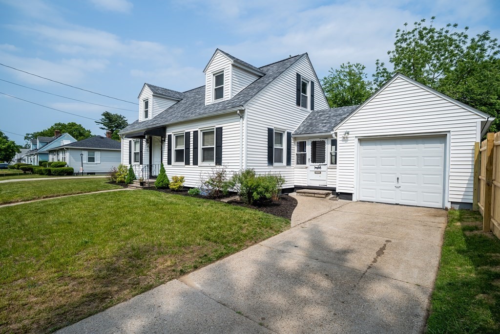 185 Pasco Road Springfield, MA 01151 - Photo 30 of 34 a front view of a house with a yard