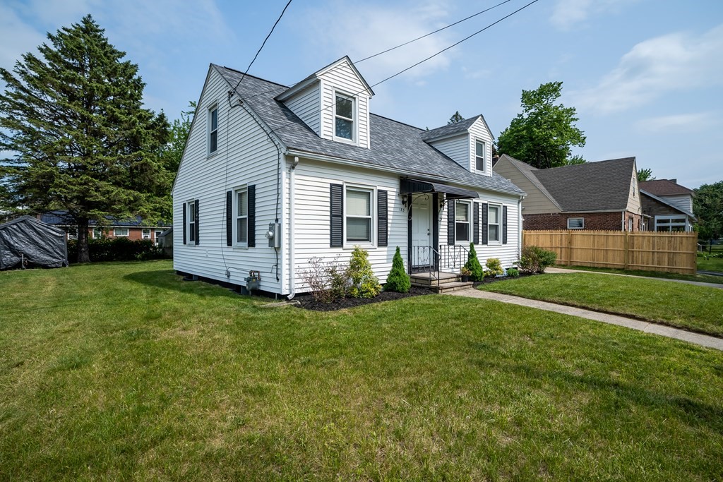 185 Pasco Road Springfield, MA 01151 - Photo 31 of 34 a view of a house with a big yard and potted plants