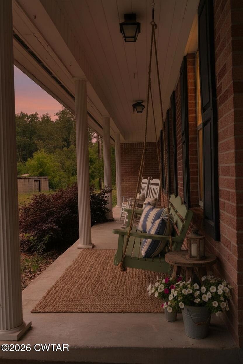 513 Viar Road Dyersburg, TN 38024 - Photo 2 of 37 a view of a balcony with chairs