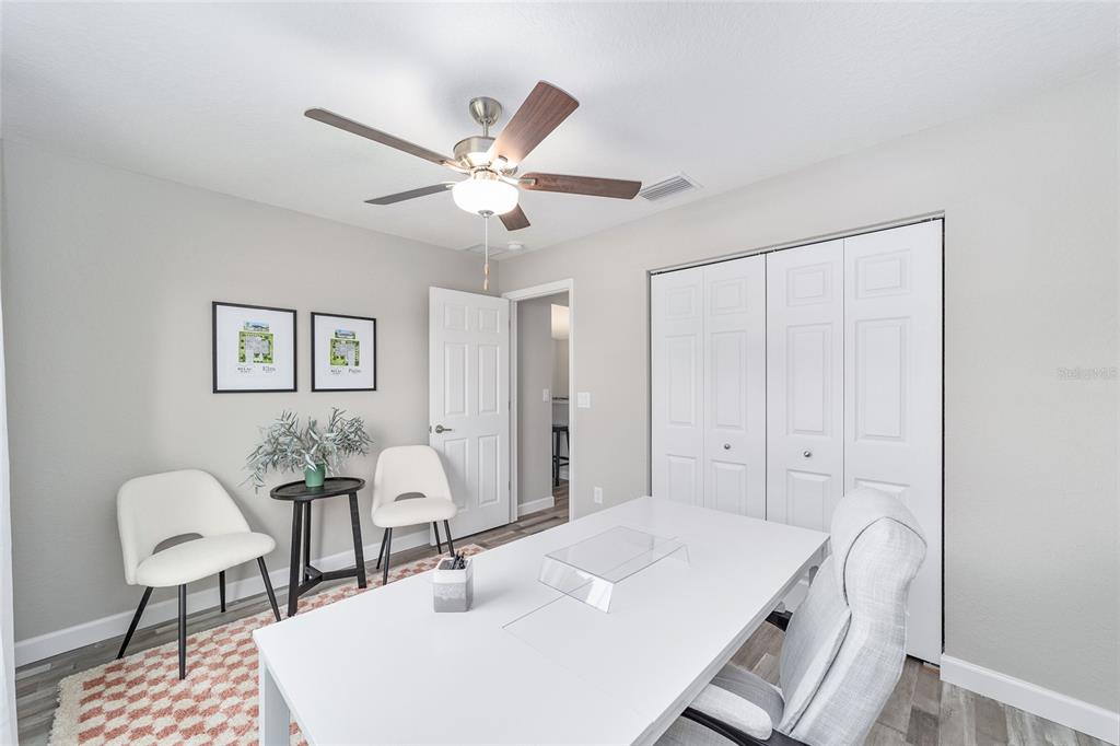 8571 Southwest 131st Place Ocala, FL 34473 - Photo 25 of 32 a view of a workspace with furniture and bathroom