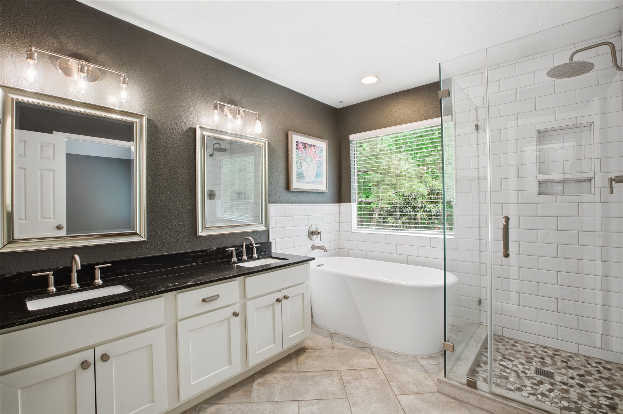 20907 Nettlebrook Lane Katy, TX 77450 - Photo 27 of 46 The glass-enclosed shower and double sinks keep things functional without losing that sense of calm.