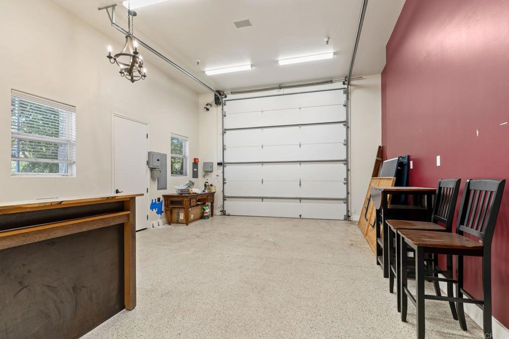 14671 Mussey Grade Road Ramona, CA 92065 - Photo 22 of 36 a view of work space with furniture and windows