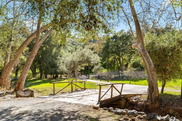 a view of a swimming pool with an outdoor space and seating area