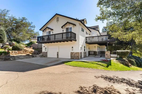 a view of a garden with a tree