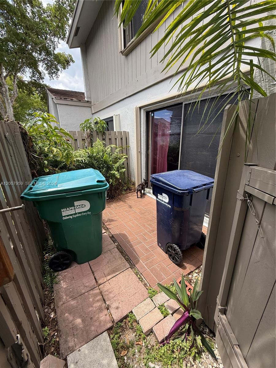 10661 Southwest 113th Place, Unit 94B Miami, FL 33176 - Photo 22 of 54 a view of outdoor space yard and patio