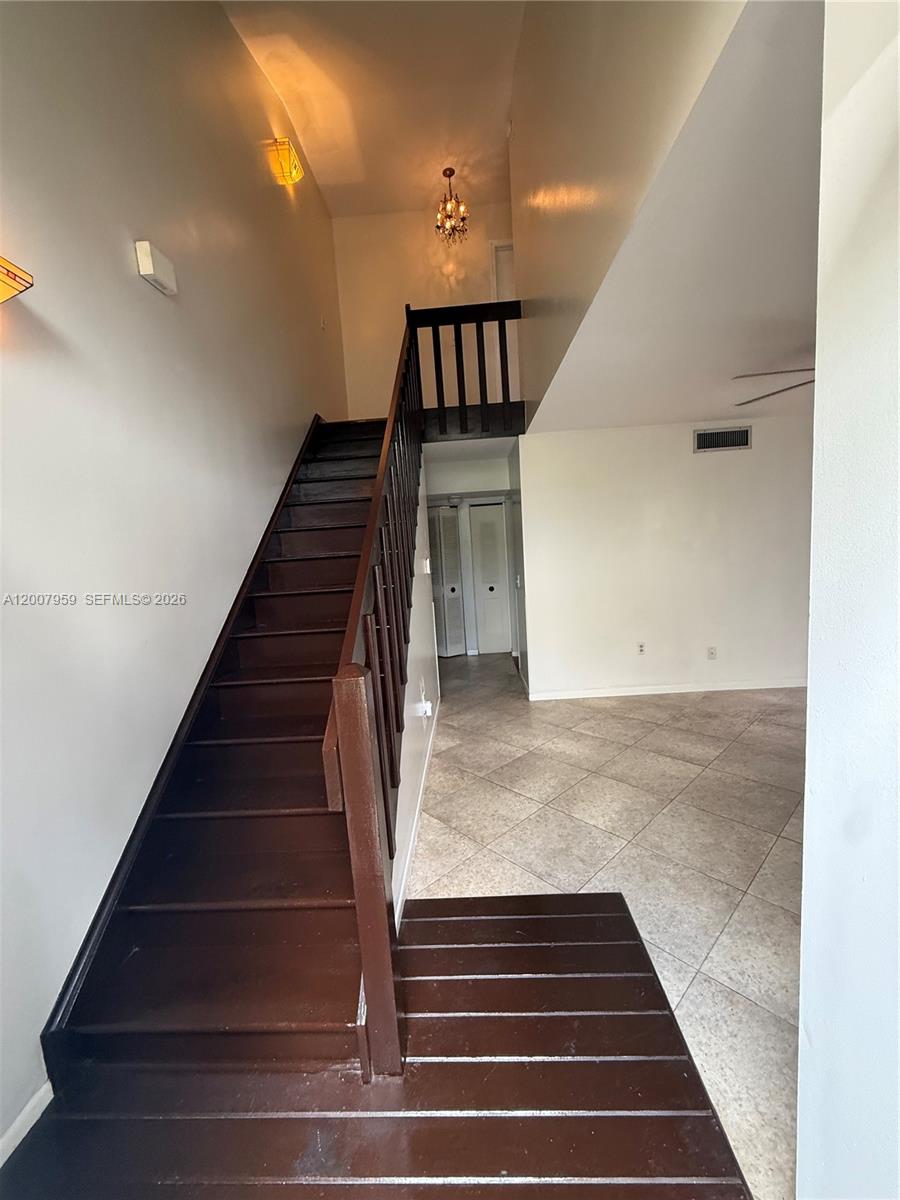 10661 Southwest 113th Place, Unit 94B Miami, FL 33176 - Photo 4 of 54 a view of entryway and hall