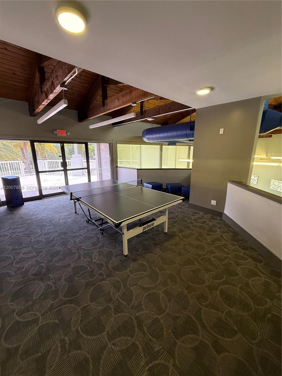10661 Southwest 113th Place, Unit 94B Miami, FL 33176 - Photo 46 of 54 a view of an empty room with windows