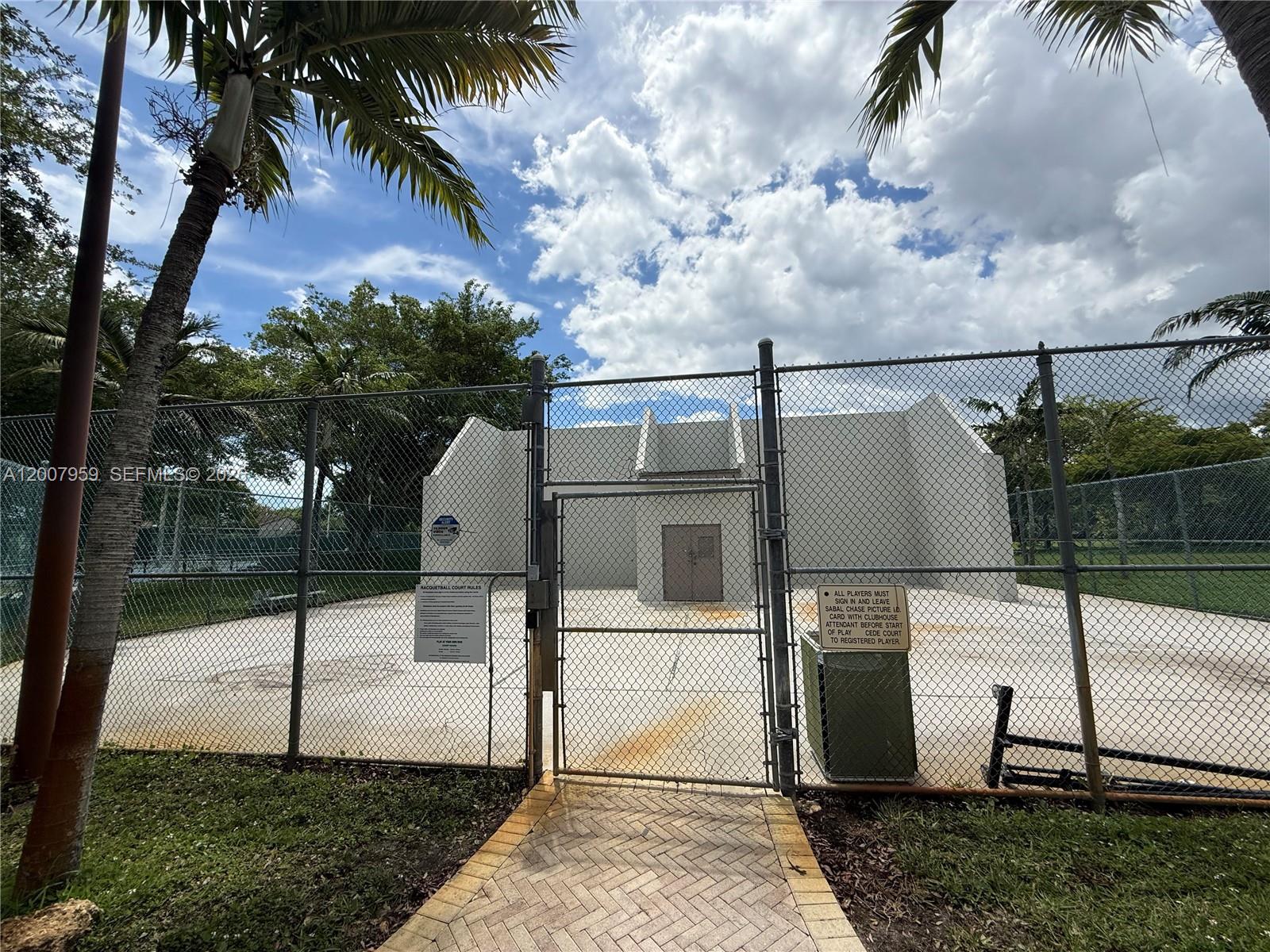 10661 Southwest 113th Place, Unit 94B Miami, FL 33176 - Photo 49 of 54 a view of a backyard