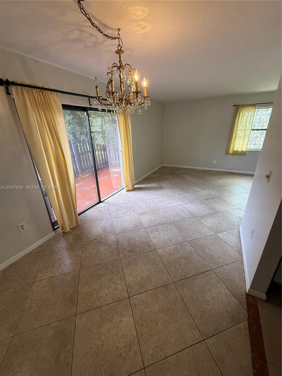 10661 Southwest 113th Place, Unit 94B Miami, FL 33176 - Photo 7 of 54 a view of entryway