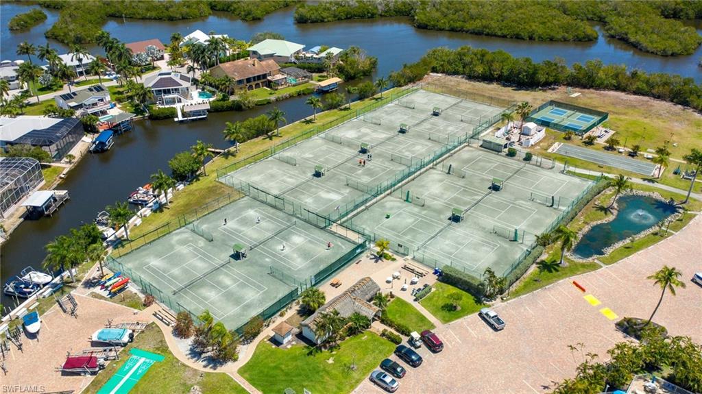 5800 Bonita Beach Road Southwest, Unit 2002 Bonita Springs, FL 34134 - Photo 18 of 24 an aerial view of a house with a lake view