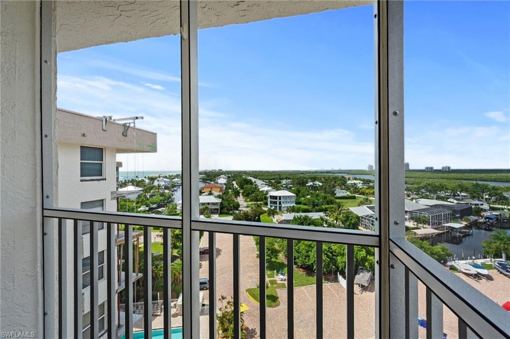 5800 Bonita Beach Road Southwest, Unit 2002 Bonita Springs, FL 34134 - Photo 3 of 24 a view of a city from a balcony