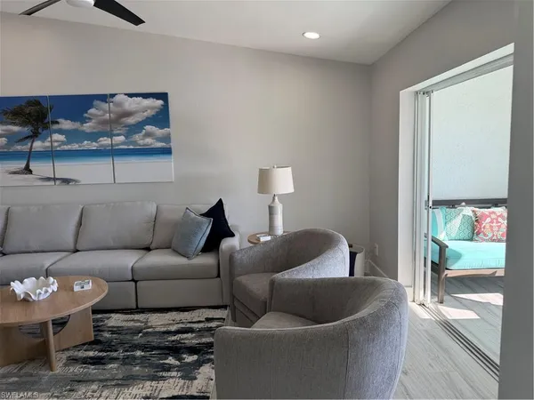 a living room with furniture and a couch