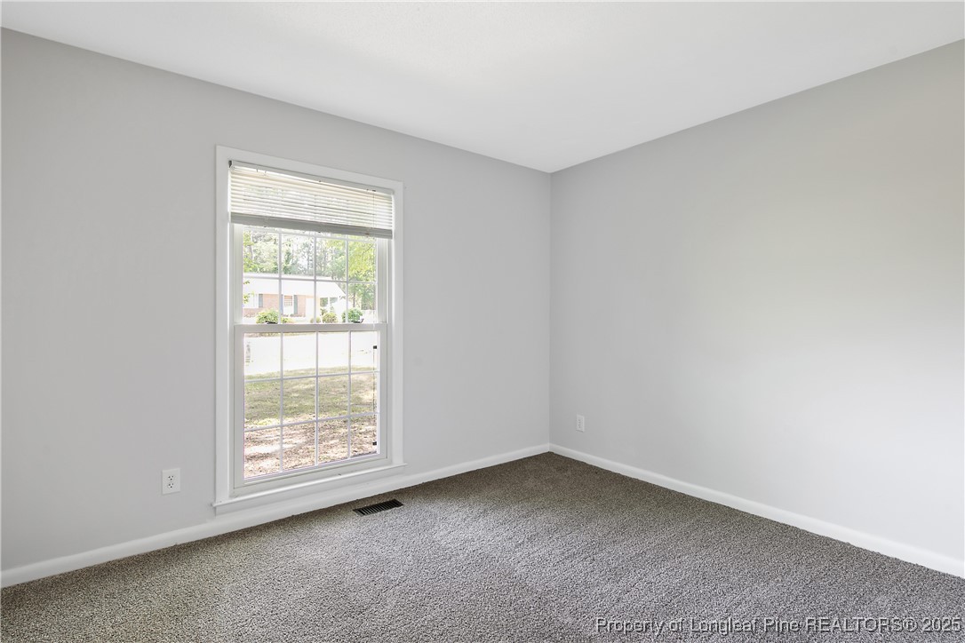 7118 Fillyaw Road Fayetteville, NC 28303 - Photo 28 of 45 an empty room with a window