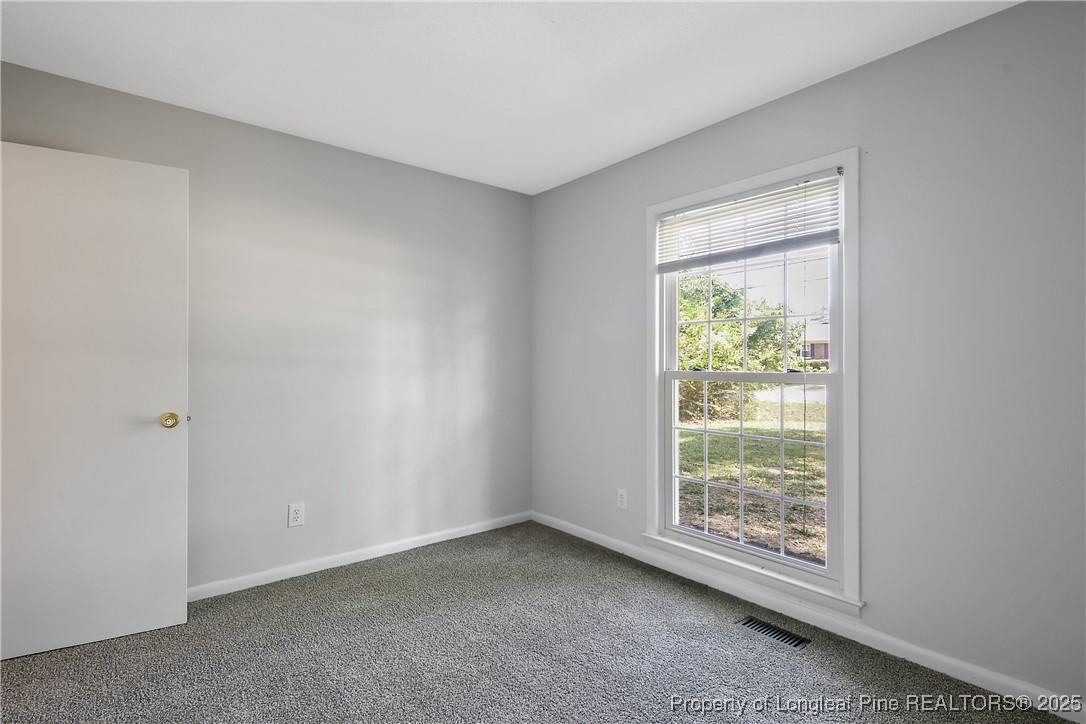7118 Fillyaw Road Fayetteville, NC 28303 - Photo 31 of 45 a view of an empty room with window