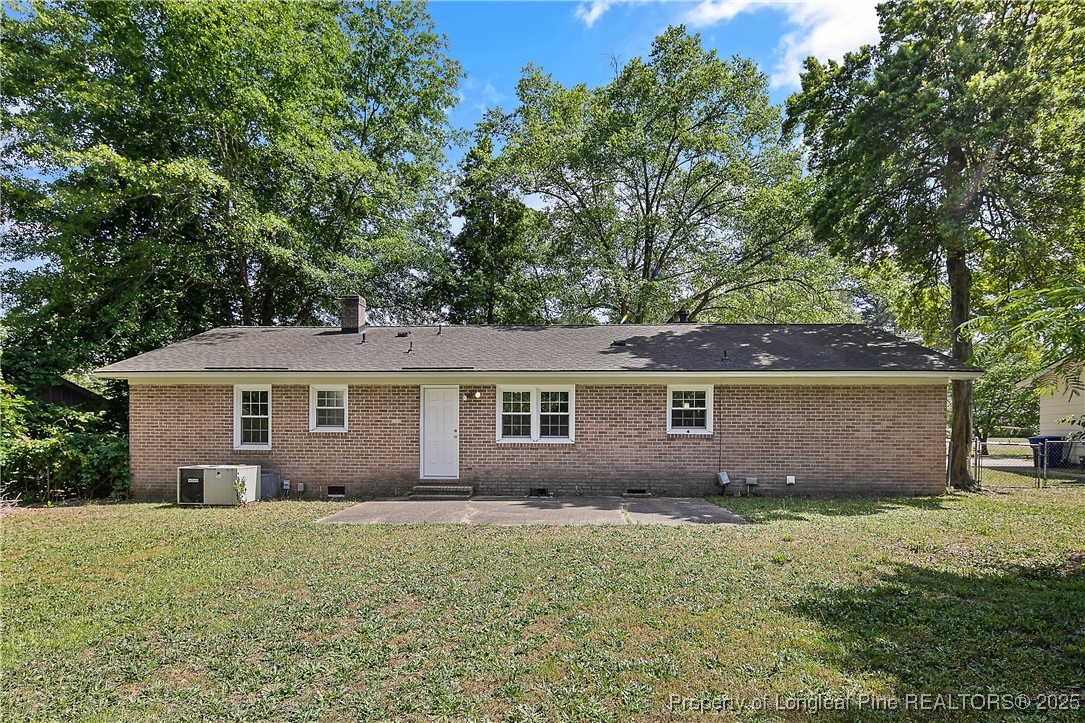 7118 Fillyaw Road Fayetteville, NC 28303 - Photo 42 of 45 front view of house with a yard