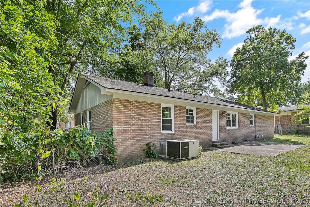 7118 Fillyaw Road Fayetteville, NC 28303 - Photo 44 of 45 a view of a house with a yard