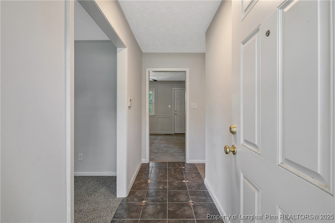 7118 Fillyaw Road Fayetteville, NC 28303 - Photo 5 of 45 a view of a hallway