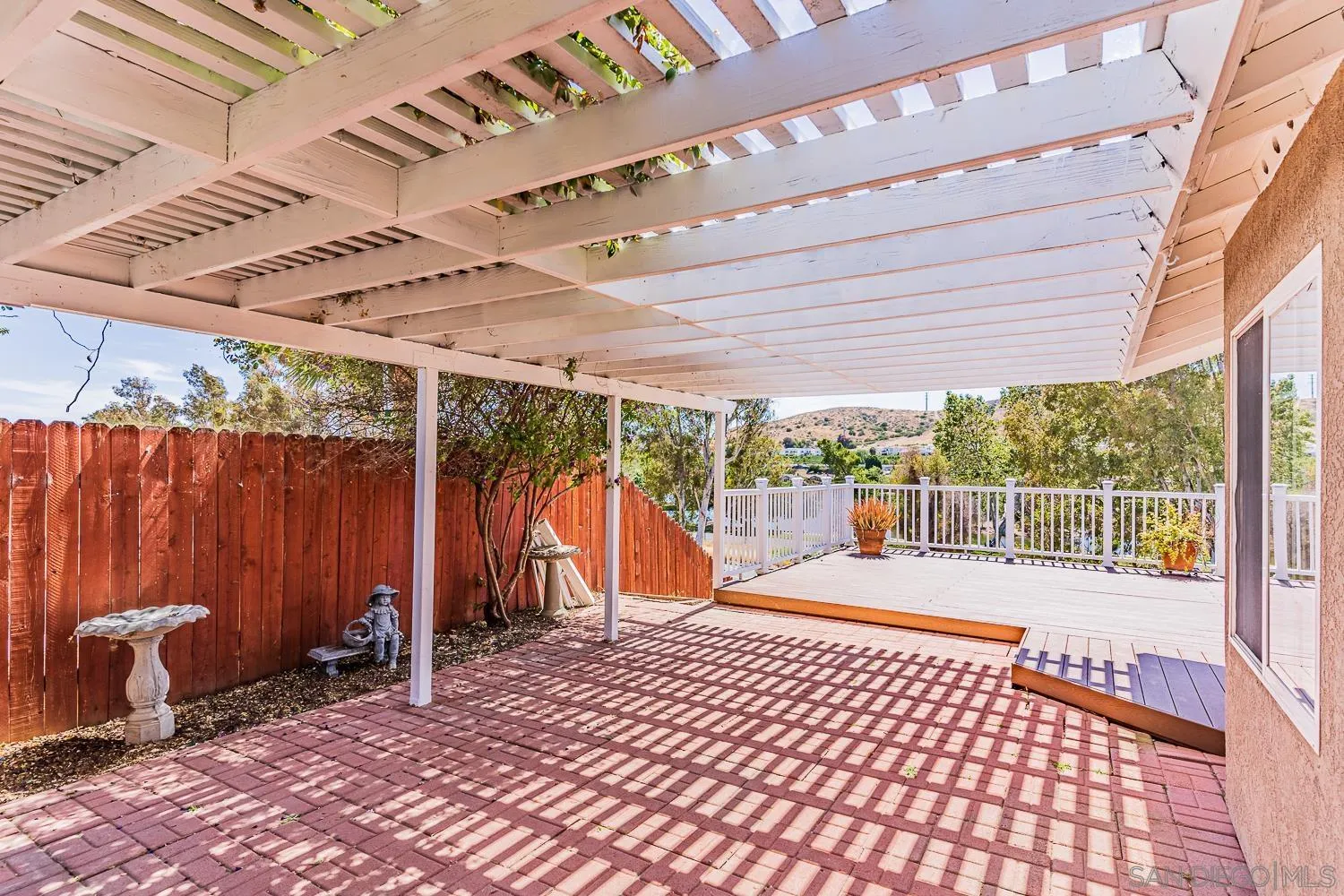 9213 Dalehurst Road Santee, CA 92071 - Photo 14 of 31 a view of a backyard with a patio