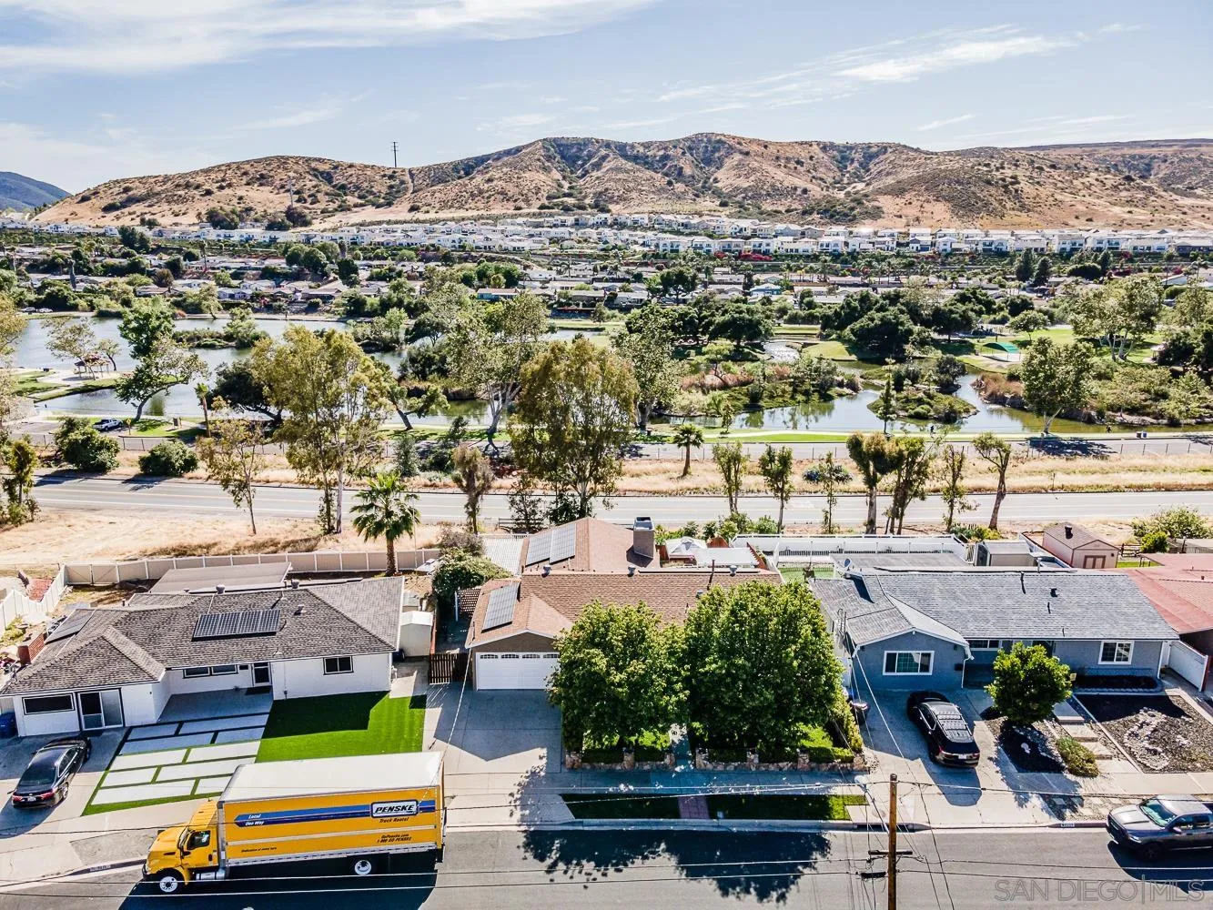 9213 Dalehurst Road Santee, CA 92071 - Photo 21 of 31 an aerial view of multiple houses with yard