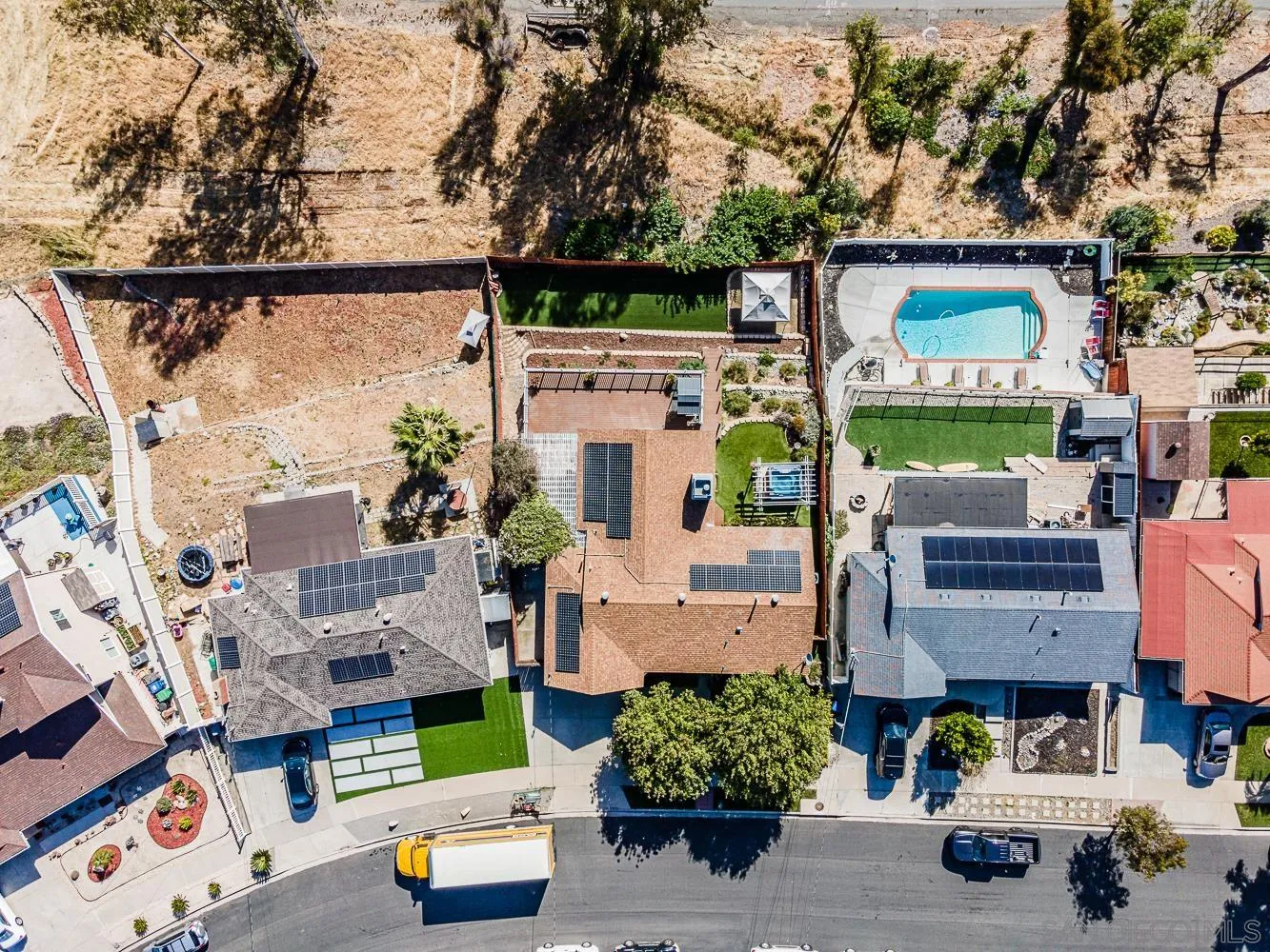 9213 Dalehurst Road Santee, CA 92071 - Photo 22 of 31 an aerial view of multiple houses with a street