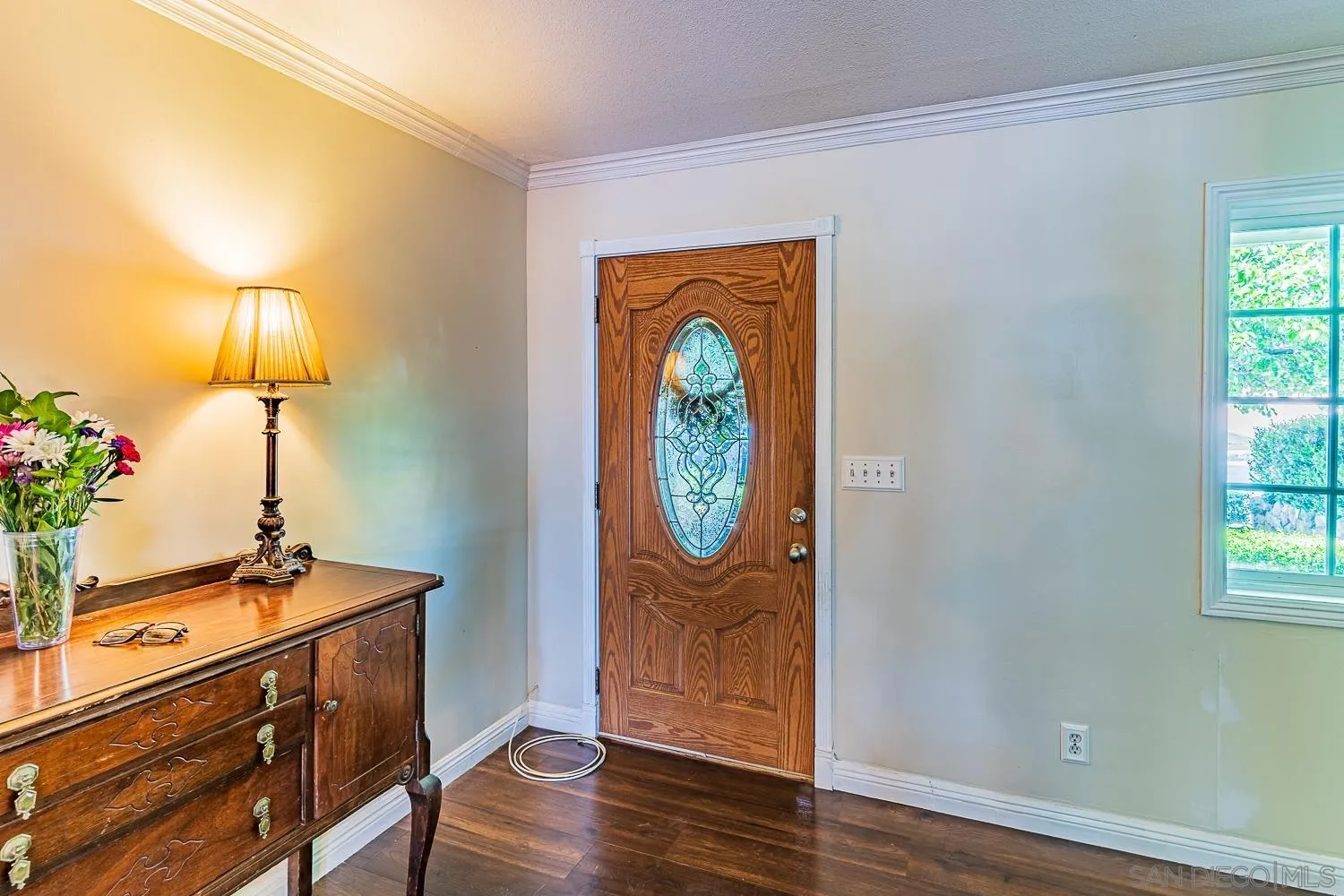 9213 Dalehurst Road Santee, CA 92071 - Photo 4 of 31 a view of an entryway with wooden floor