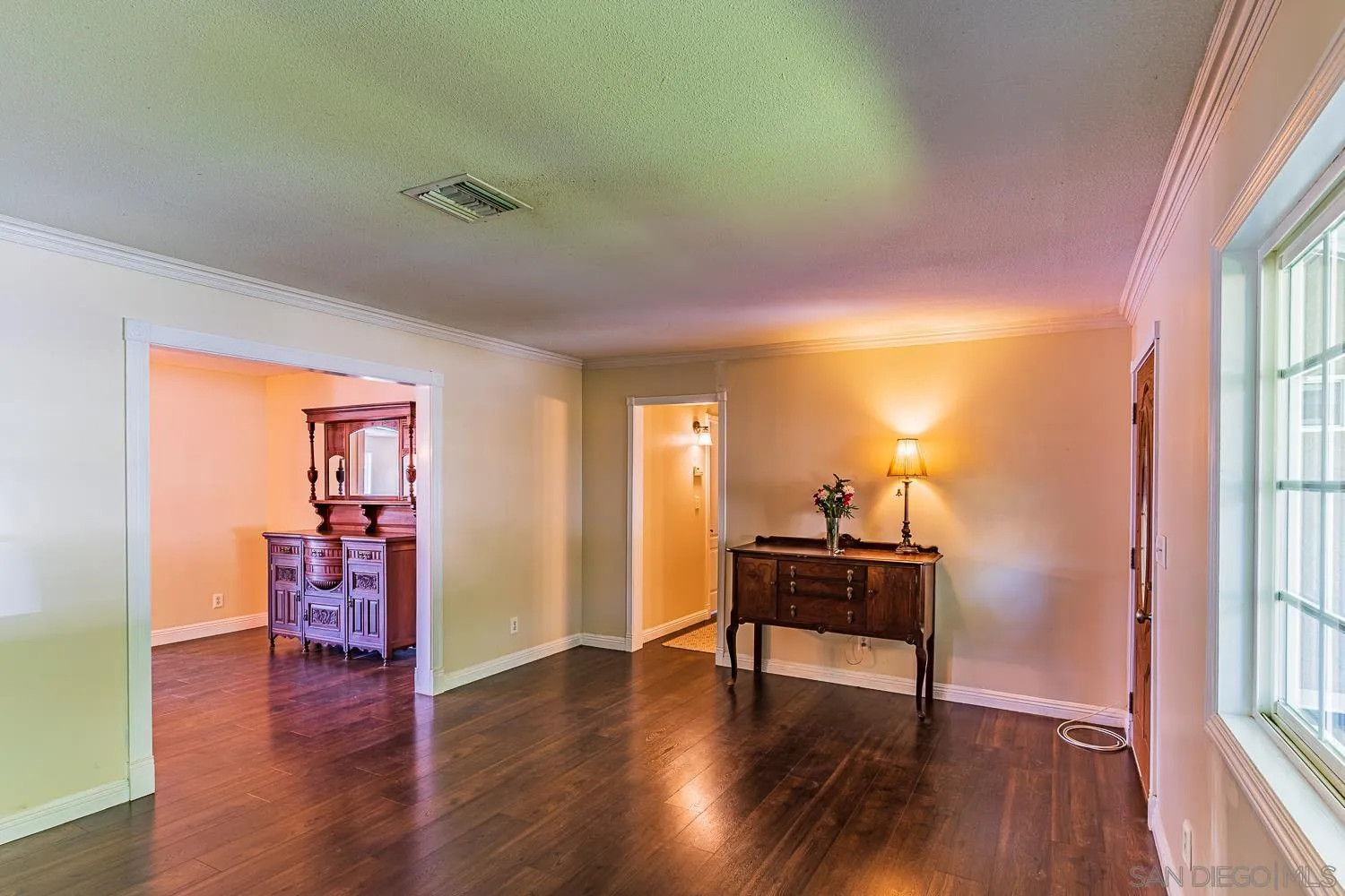 9213 Dalehurst Road Santee, CA 92071 - Photo 5 of 31 a view of a livingroom with furniture and wooden floor