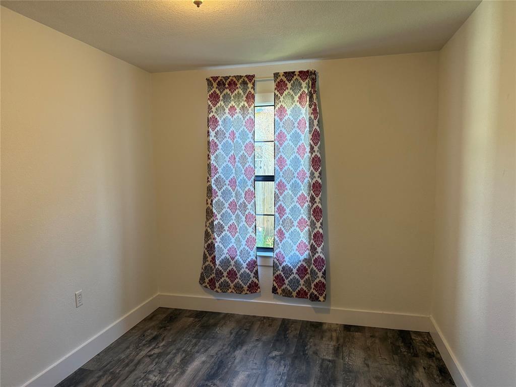 122 Tobacco Road Whitney, TX 76692 - Photo 21 of 35 a view of a beautiful room