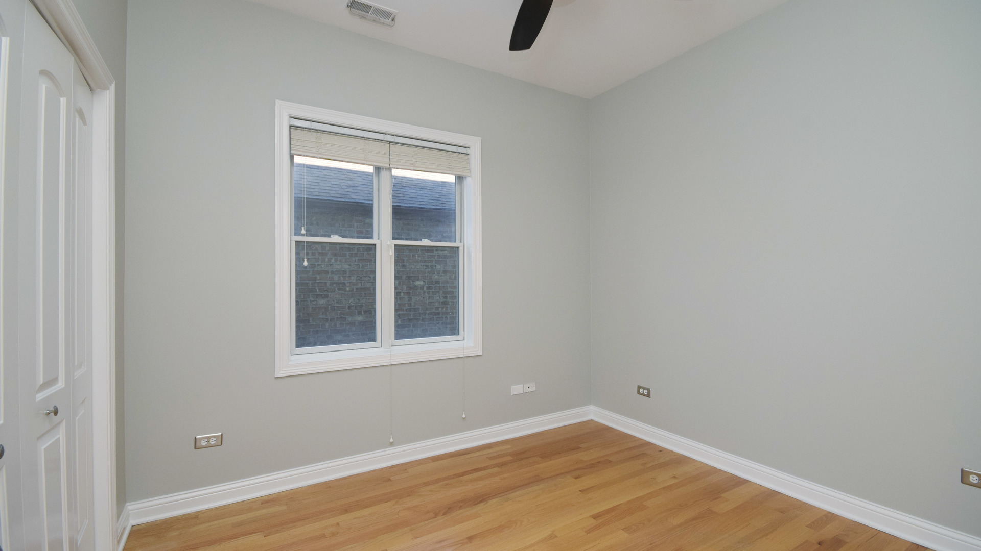6065 North Ridge Avenue, Unit 2 Chicago, IL 60660 - Photo 11 of 17 an empty room with a window